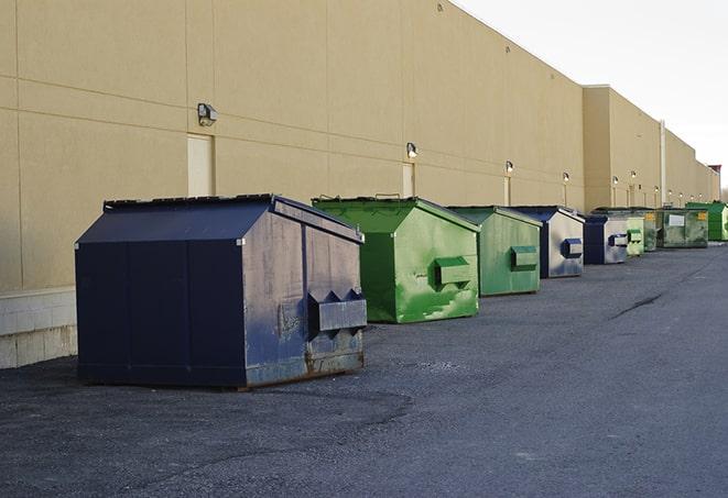 a pile of rugged and heavy-duty dump containers ready for construction waste in Ava